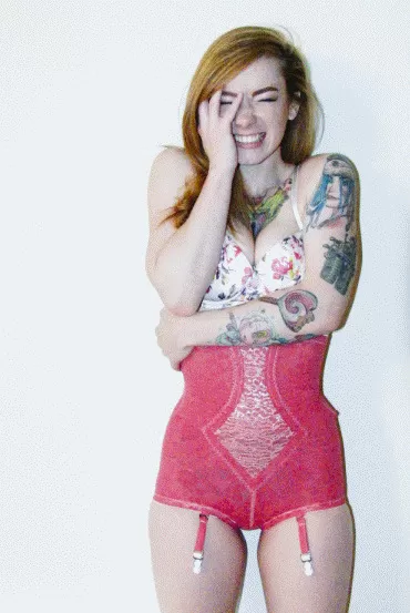 Redhead tattooed sexy girl